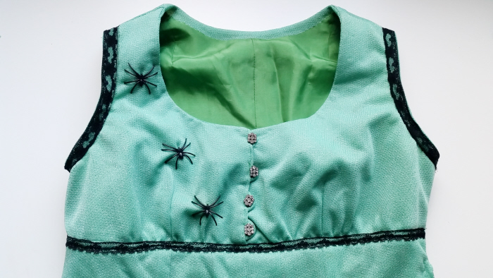 Refashioned vintage dress with spider embellishments